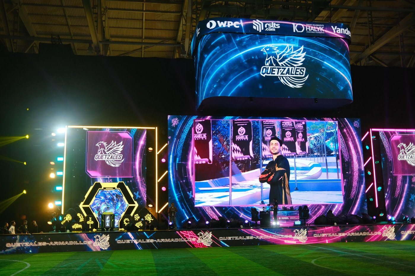 The Quetzales arena stage in full production lights